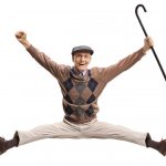 Overjoyed Man With Cane Jumping